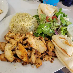 chicken, rice, salad, and pita