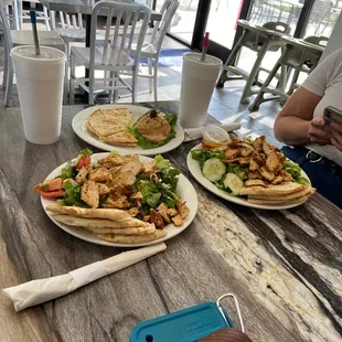 Greco Traditional Greek Salata with grilled chicken, and tomato basil hummus.