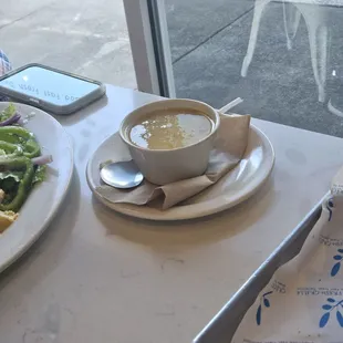A cup of Avegolemono soup