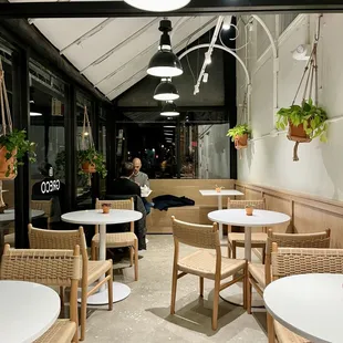 a man sitting at a table in a restaurant