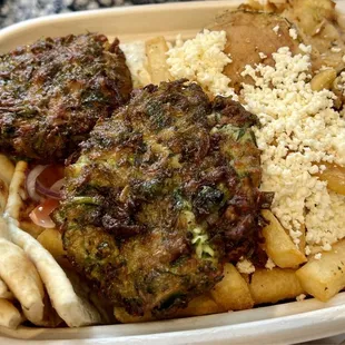 Veggie Plate with pita, Greco Fries, spicy feta and zucchini chips