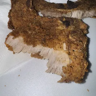 The fried pork chops were over fried and old