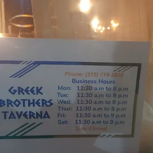 a business hours sign