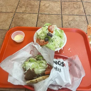 Lamb gyro with a side salad