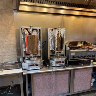 a row of commercial kitchen equipment