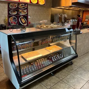 a counter with a variety of food items