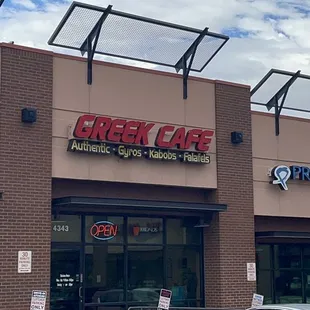 a car parked in front of the restaurant