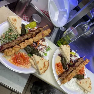 Mediterranean Platter Which is came with Greek salad, Side of Hummus and pita Side of. kabab but I added one Extra skewers