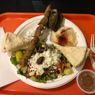 mediterranean kabob platter - steak | salad | pita | grape leaves | hummus | cucumber sauce