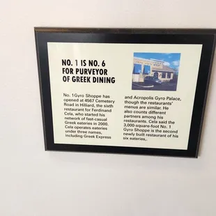 a sign on the wall of a restaurant