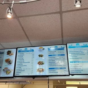 menus on the wall of the restaurant