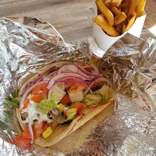 Souvlaki Sandwich and fries.