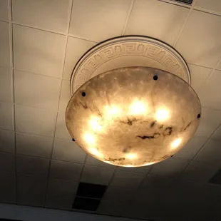a light fixture in a restaurant