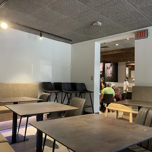 a restaurant with tables and chairs