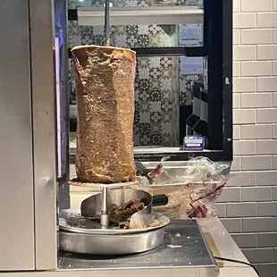 a meat roaster in a kitchen