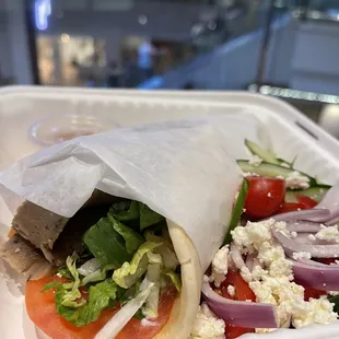 a sandwich in a styrofoam container