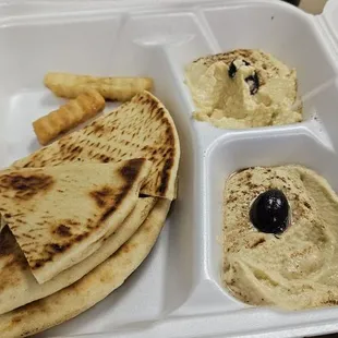 Pita and hummus with a stray fry or two.
