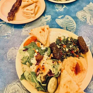 Greek salad, lamb kebab, veggie sampler