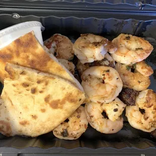 Shrimp with pita bread and tzatziki
