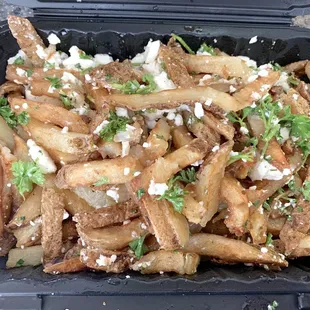 Greek fries - feta cheese, lemon juice, olive oil, parsley