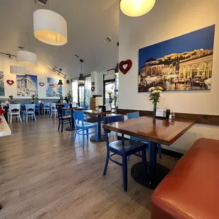 a restaurant with tables and chairs