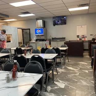 tables and chairs in a restaurant