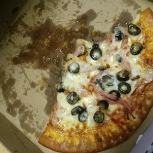 Ham and Black olive. 10&quot; rather what&apos;s left of it. Cooked to that perfect moment between cheesy and crispy