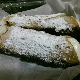 Cannolis (2) are incredibly sweet. The filling is a little thick and gritty, but good for those w/ a sweet tooth.