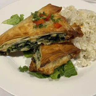 Spanakopita - Savory spinach pie made with spinach, feta, onions, and phyllo dough