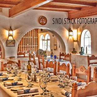 a dining room with tables and chairs