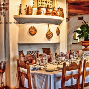 a long table with white tablecloths