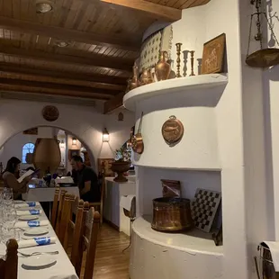 a long table with white tablecloths