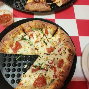 a pizza with a slice missing