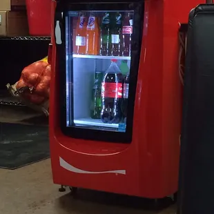 The soda fridge.