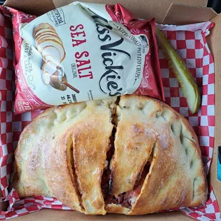 a bag of chips and a sandwich