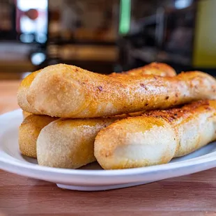 Breadsticks coated in Garlic Butter sauce