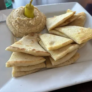 Hummus appetizer with grilled pita