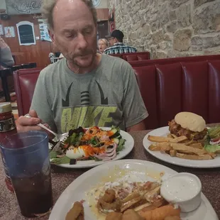 This is part of sampler platter Salad Hamburger and fries