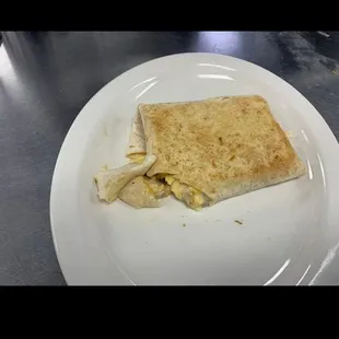 Sausage gravy , egg, hashbrown, cheese burrito