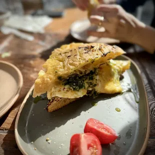 Egg and cheese with pesto