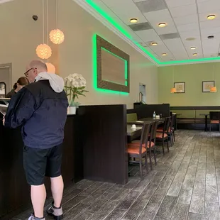 a man standing at a counter