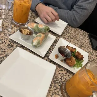 Spring rolls, crispy dumplings, &amp; Thai tea soooooo yum!