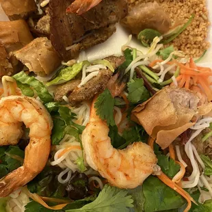 Bun Thap Cam- rice noodle, grilled pork, shrimps, egg rolls, cucumber, pickled carrots &amp; herbs. So good!
