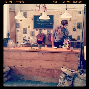 a man standing at a bar