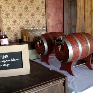two wine barrels on a table