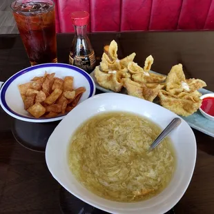 Egg drop soup (I added some soy sauce).. home made--fried noodles and crab Rangoon...yes, their Sweet Green Tea is fire