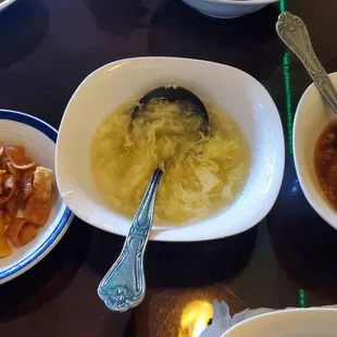 Egg drop soup,  hot and sour soup,  crispy noodles