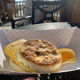 Breakfast sandwich with bacon on a biscuit