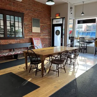 a wooden table and chairs
