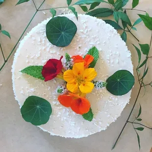 Custom Raw Vegan GF Birthday Cake!
   Heavenly Coconut with fresh nasturtiums